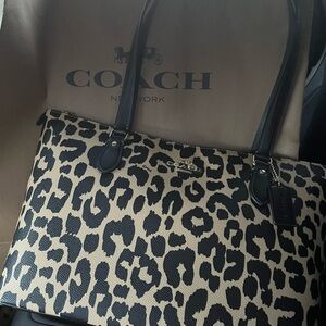 NWOT leopard print coach bag.